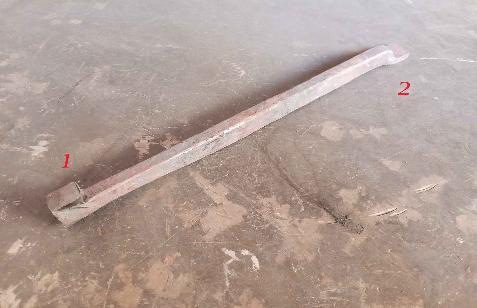 Forged steel blank for a snarling iron with marked striking and mounting points for heritage restoration in the Pro Monumenta project.